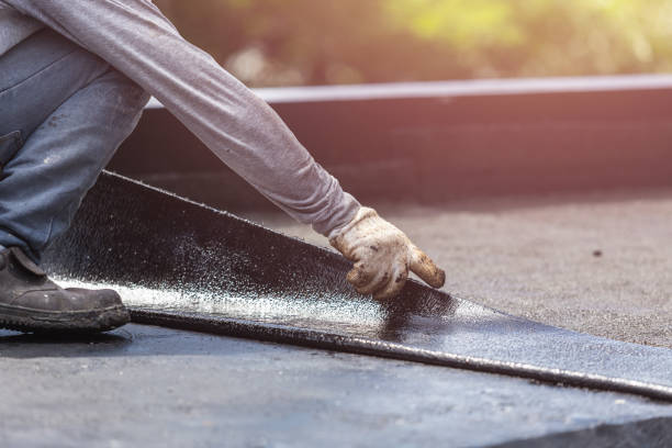 Professional Waterproofing technician working in Rensselaer, NY